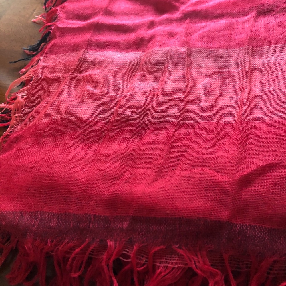 Gauzy red plaid  scarf with fringe.
